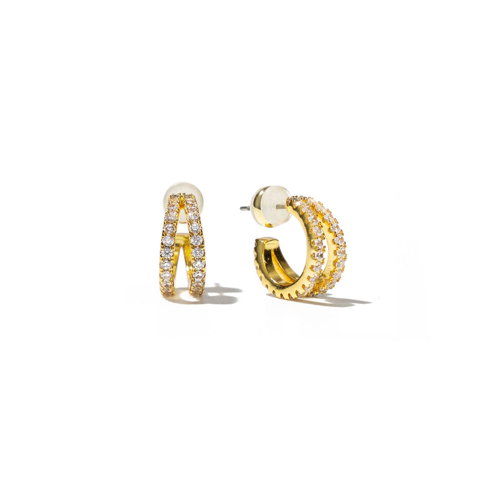 Gold hoop earrings with diamond accents on a white background
