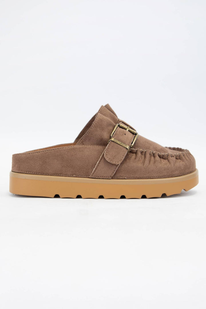 brown moccasin slipper mule with a buckle