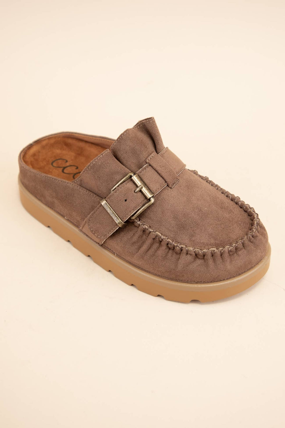 brown moccasin slipper with a buckle